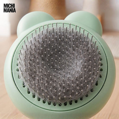 Cepillo con Botón Extractor de Pelos