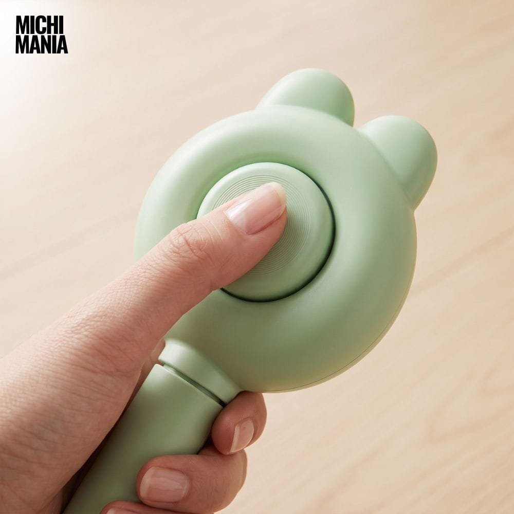 Cepillo con Botón Extractor de Pelos
