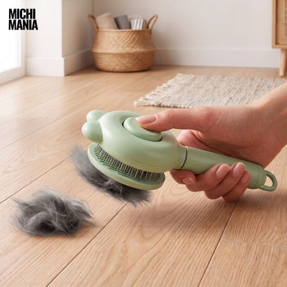 Cepillo con Botón Extractor de Pelos