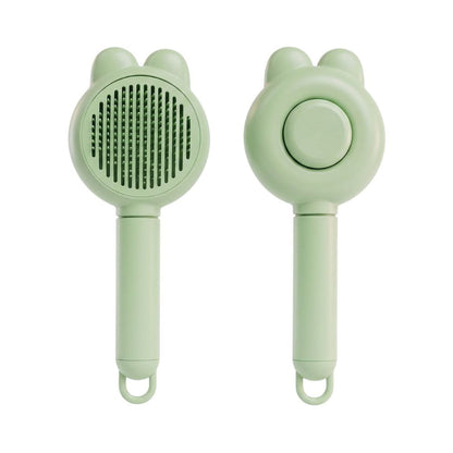 Cepillo con Botón Extractor de Pelos